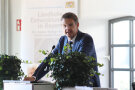 Redner Christian Kreye am Rednerpult.