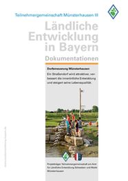 Abbildung der Titelseite der Abschlussdokumentation zur Dorferneuerung Tagmersheim mit Kindern am Wasserspielplaz. 